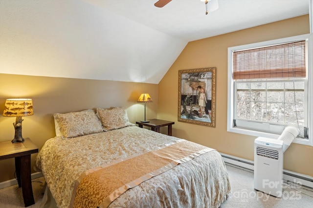 bedroom with lofted ceiling, carpet, ceiling fan, and baseboard heating