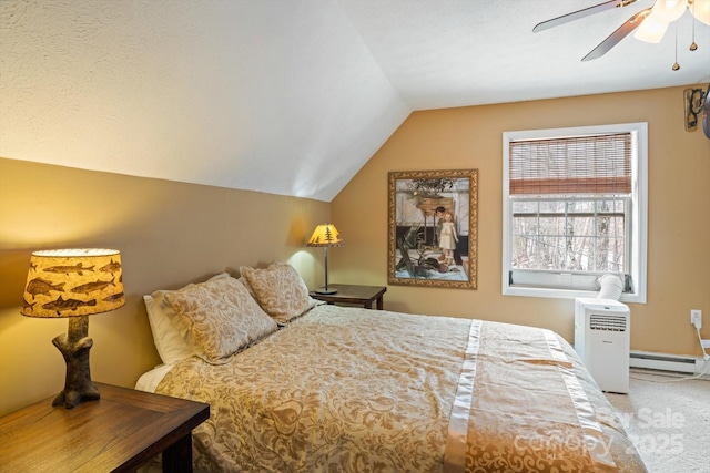 bedroom featuring lofted ceiling, carpet floors, and ceiling fan