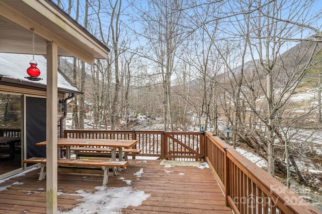 view of snow covered deck