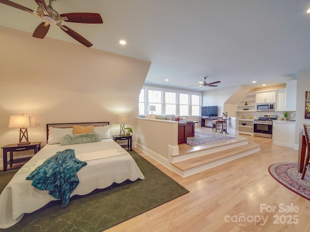 bedroom with light hardwood / wood-style floors