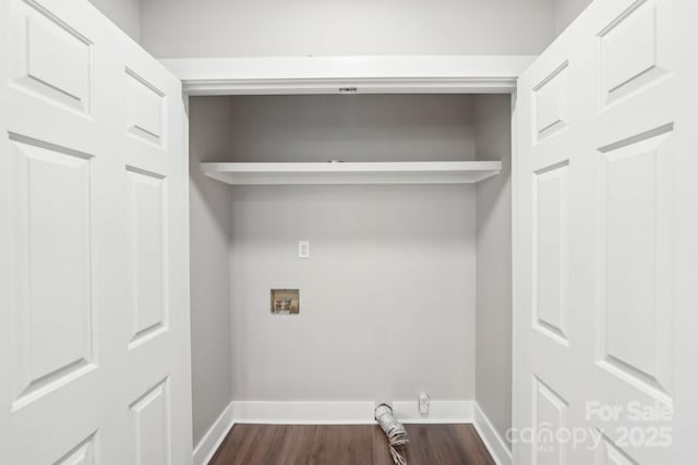 washroom featuring dark hardwood / wood-style flooring and hookup for a washing machine