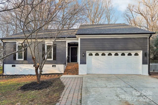 ranch-style home with a garage