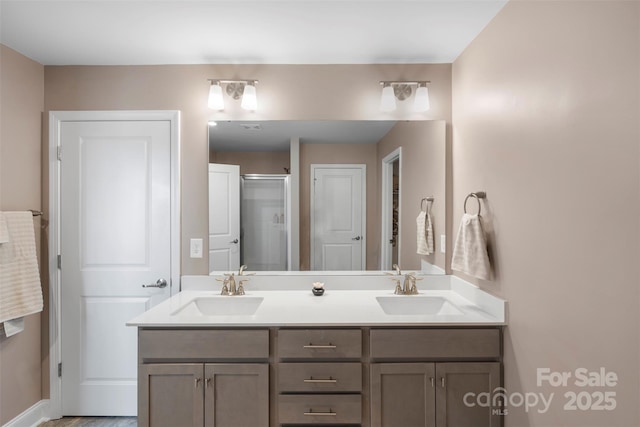 bathroom with vanity and walk in shower