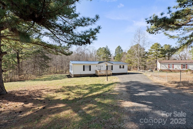 view of front of home with a front lawn