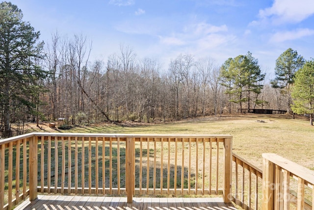 wooden deck with a yard