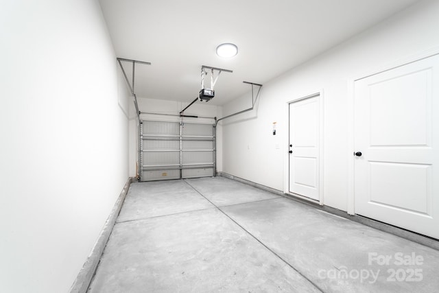 garage featuring a garage door opener