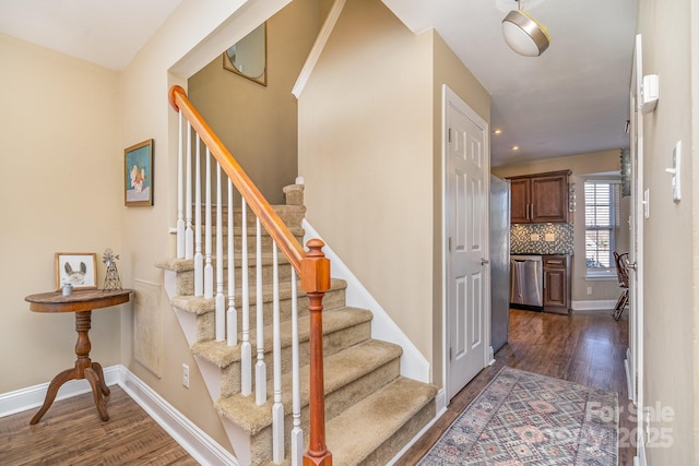 stairway with wood-type flooring