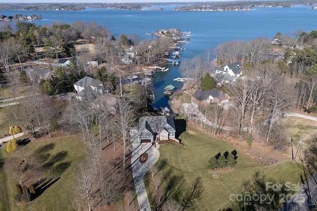 birds eye view of property featuring a water view