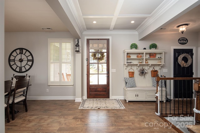 entrance foyer with coffered ceiling, ornamental molding, dark hardwood / wood-style floors, and beam ceiling