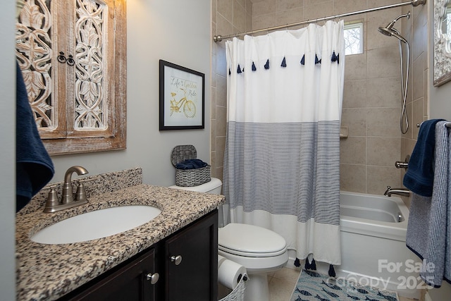 full bathroom featuring vanity, toilet, tile patterned flooring, and shower / tub combo