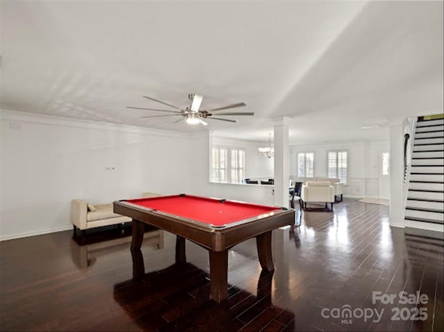 rec room with ornamental molding, ceiling fan with notable chandelier, hardwood / wood-style floors, and billiards