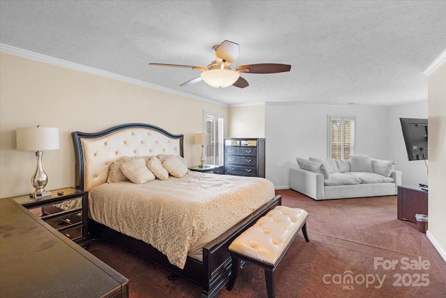 carpeted bedroom with ornamental molding, ceiling fan, and a textured ceiling