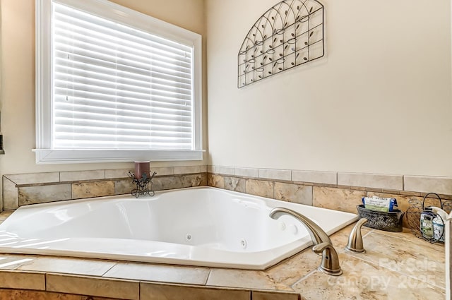 bathroom with a relaxing tiled tub