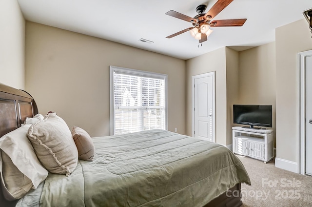 bedroom featuring ceiling fan and carpet flooring