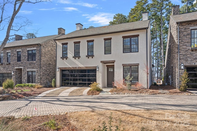 view of front of home featuring a garage