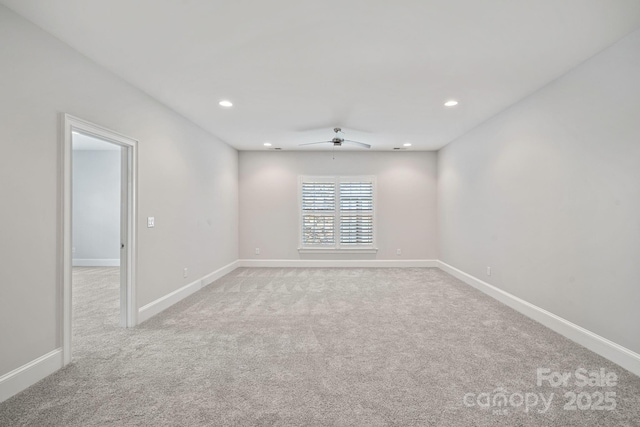 carpeted empty room with ceiling fan