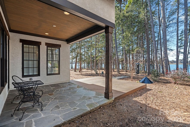 view of patio / terrace with a water view