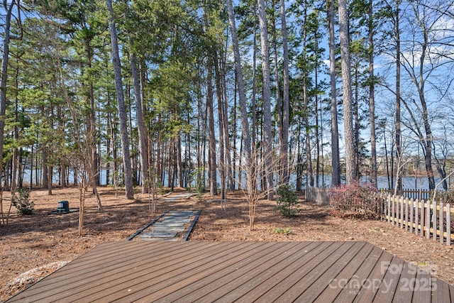 deck featuring a water view