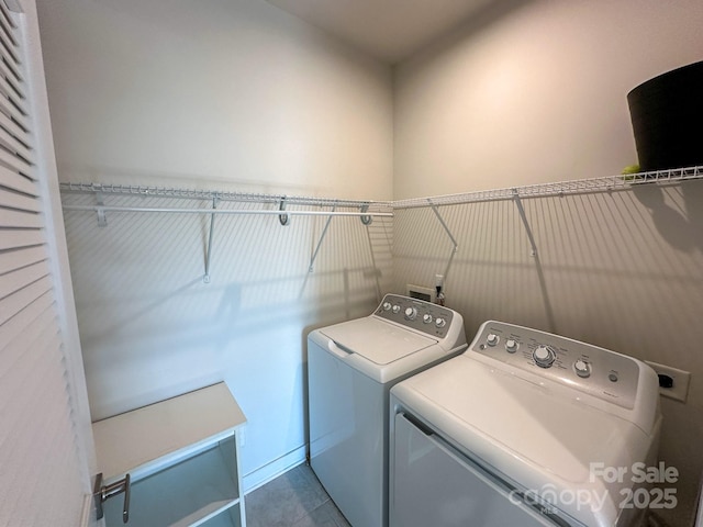 laundry area with washing machine and dryer