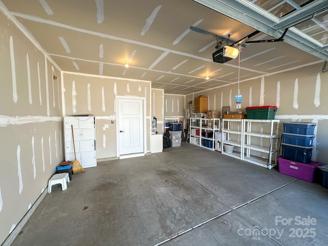 garage featuring a garage door opener