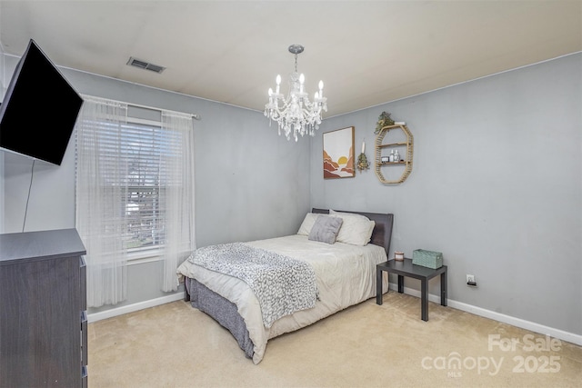 bedroom with a chandelier, light colored carpet, visible vents, and baseboards