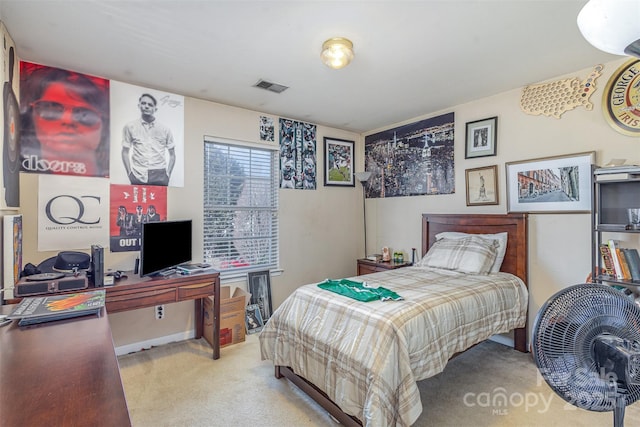 bedroom featuring carpet flooring and visible vents