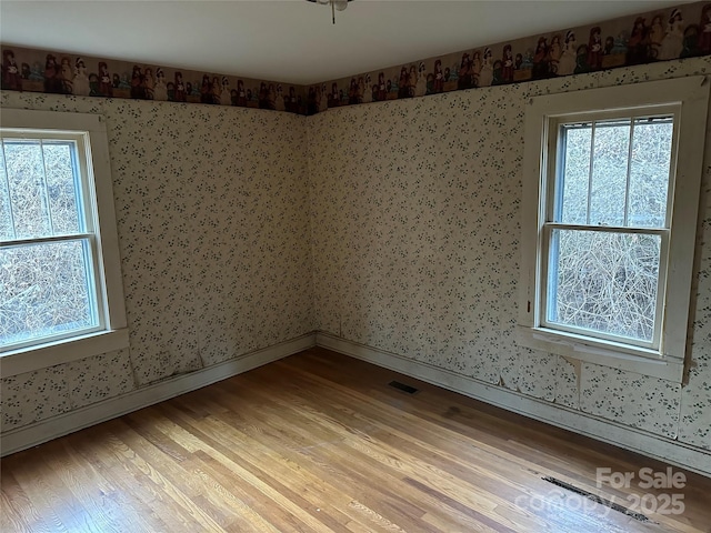 empty room featuring light hardwood / wood-style floors