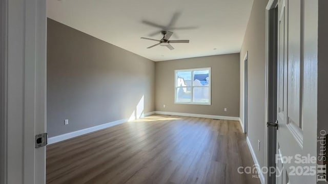 unfurnished room featuring wood-type flooring and ceiling fan