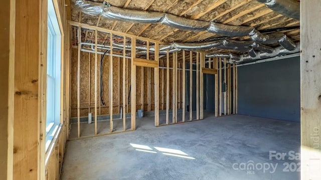 misc room with concrete floors