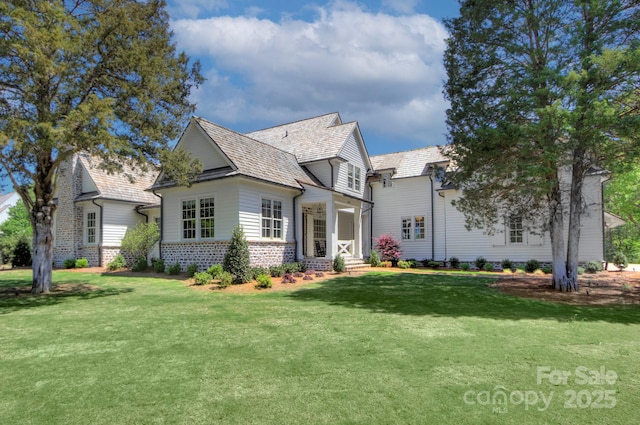 view of front of house with a front lawn