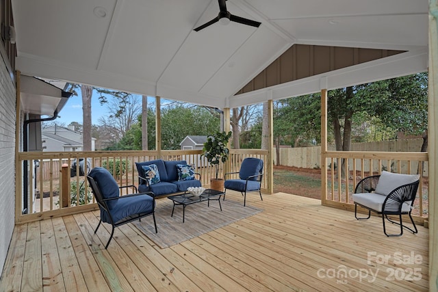 sunroom / solarium with vaulted ceiling and ceiling fan