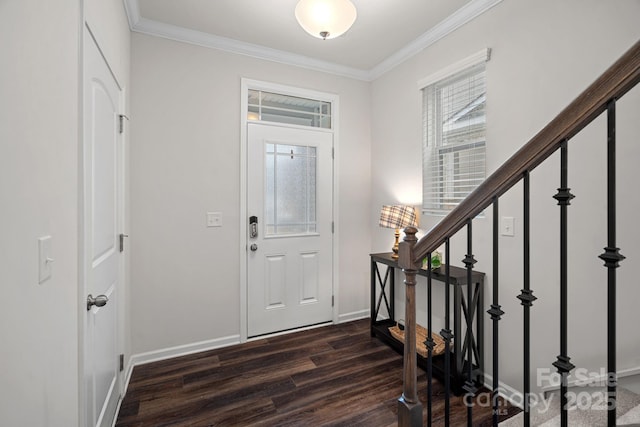 entryway with dark wood-type flooring, crown molding, baseboards, and stairs