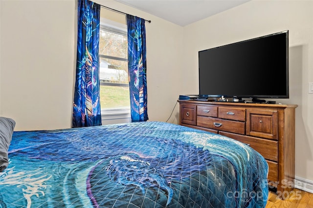 bedroom featuring hardwood / wood-style flooring