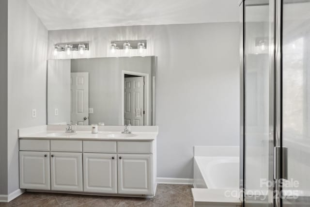 bathroom featuring vanity and shower with separate bathtub