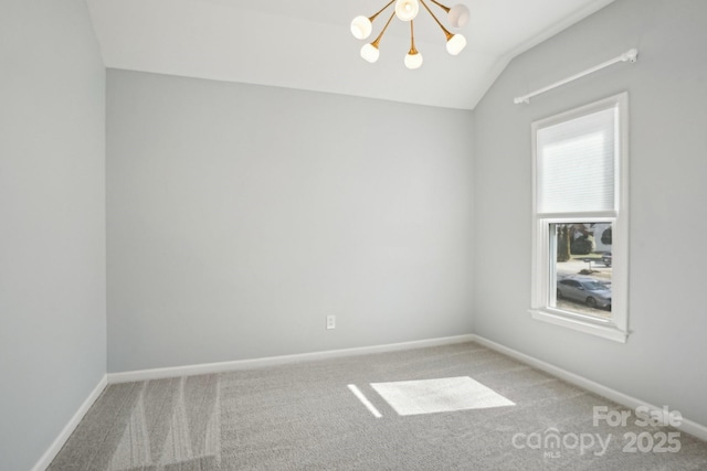 unfurnished room featuring lofted ceiling, carpet, and a notable chandelier