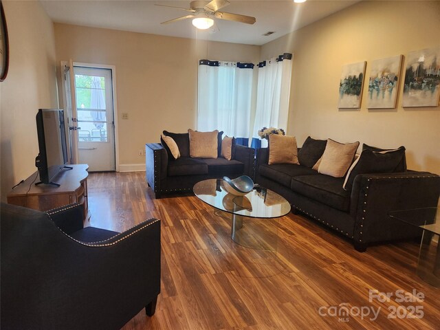 979 W Chapel Rd, Asheville, NC 28803 - living room with wood finished floors, ceiling fan, and baseboards