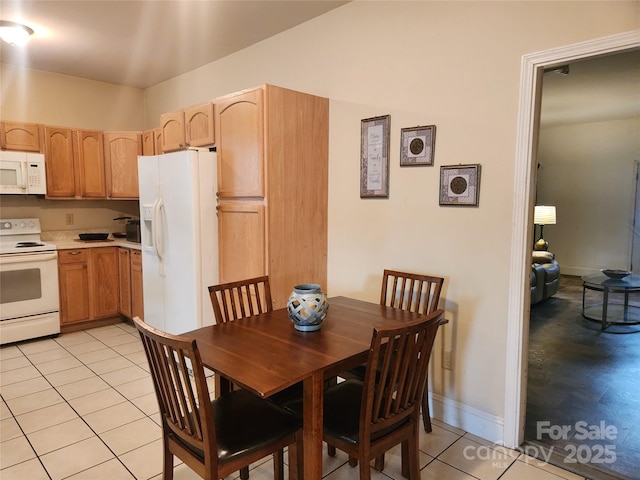 979 W Chapel Rd, Asheville, NC 28803 - dining space with light tile patterned flooring and baseboards