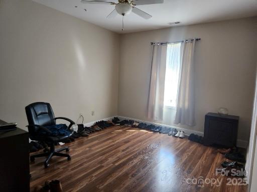 979 W Chapel Rd, Asheville, NC 28803 - unfurnished office featuring wood finished floors, a ceiling fan, and baseboards