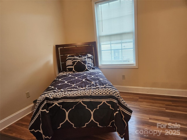 979 W Chapel Rd, Asheville, NC 28803 - bedroom featuring wood finished floors and baseboards