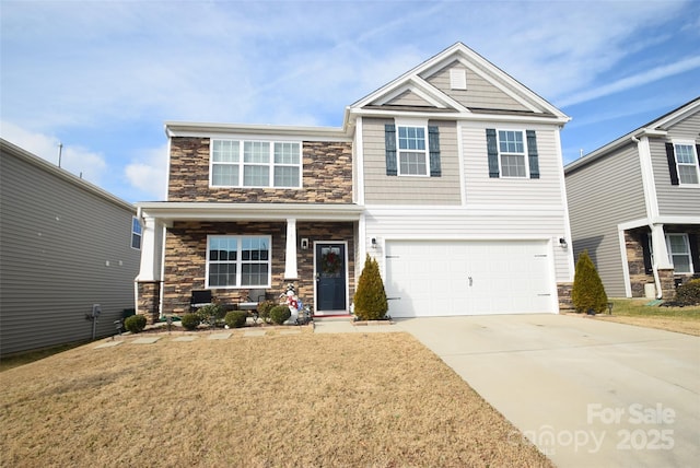 craftsman-style home featuring a garage and a front lawn