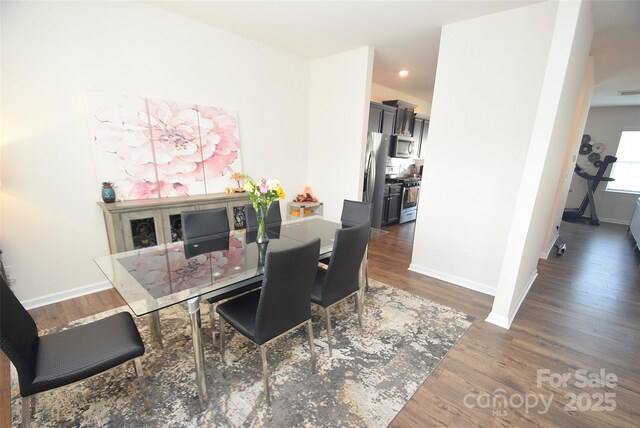 dining room featuring dark wood-type flooring