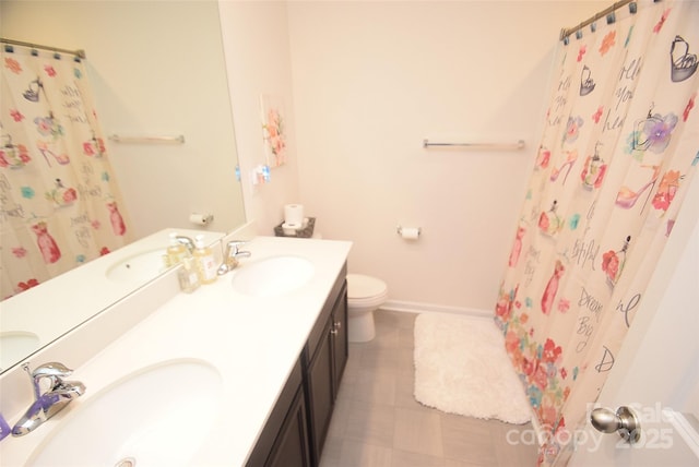 bathroom with vanity, a shower with curtain, and toilet