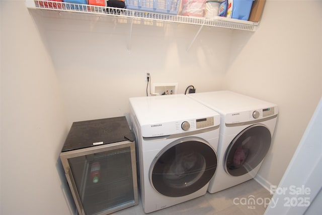 laundry room featuring washer and clothes dryer