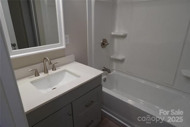 bathroom featuring vanity and shower / bathing tub combination