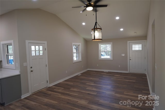 entryway with high vaulted ceiling, dark hardwood / wood-style floors, and ceiling fan