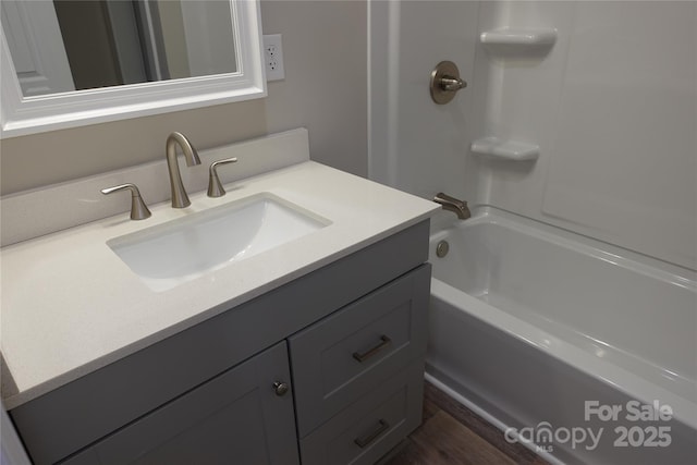 bathroom with vanity and tub / shower combination