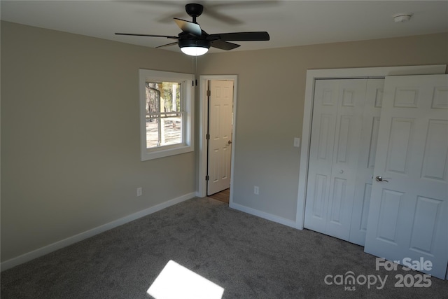 unfurnished bedroom featuring a closet, ceiling fan, and carpet