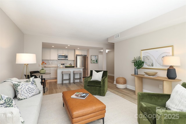 living room with light wood-type flooring