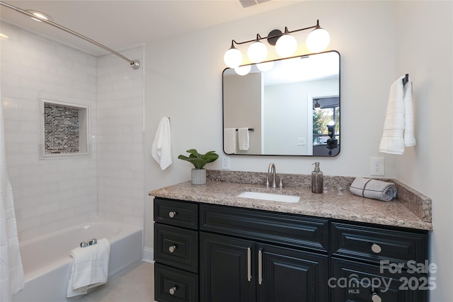 bathroom with vanity and shower / bath combo with shower curtain