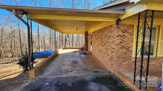 view of patio featuring a carport